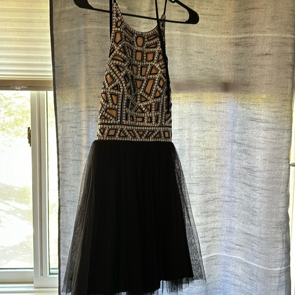 Formal Teen dress.   Great for Homecoming.   Worn 1x prof cleaned.  Size 3.